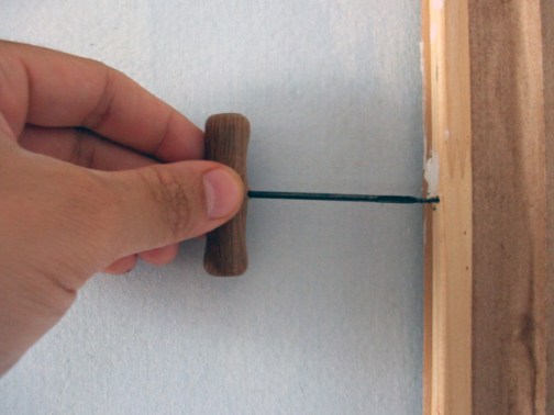 enroscar cancamo bastidor cuadro